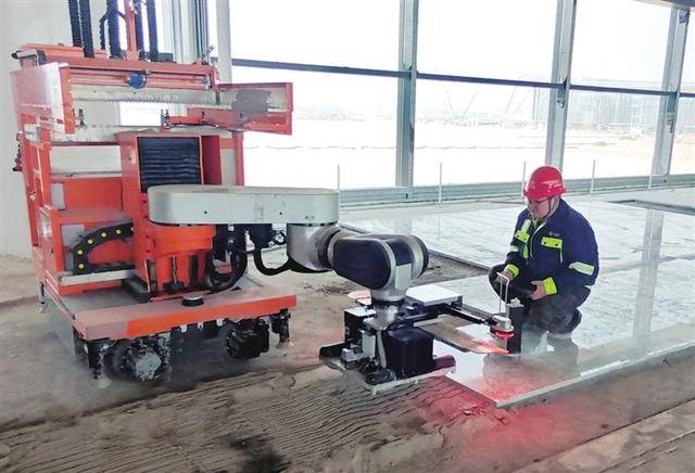 石材鋪貼用上建築施工機器人 太原機場T3航站樓室內裝修提質效